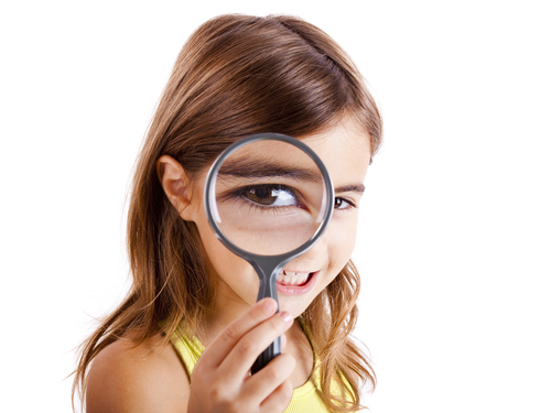 girl magnifying glass